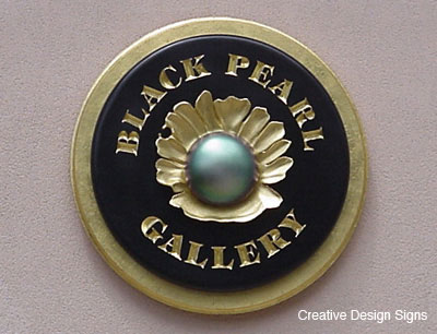 Black Pearl Gallery - Carved HDU shell, iridescent glaze over silver leaf pearl on engraved oval.