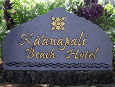 Kaanapali Beach Hotel - Sand carved granite face with raised lettering and tapa-cloth logo. Mounted on custom rock base.