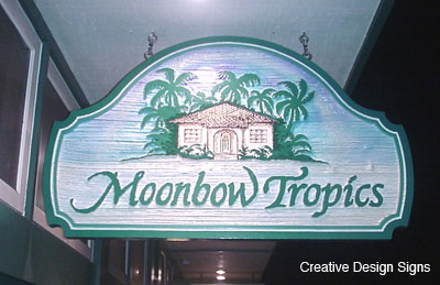 Moonbow Tropics - Redwood double faced hanging blade sign with airbrushed accents.