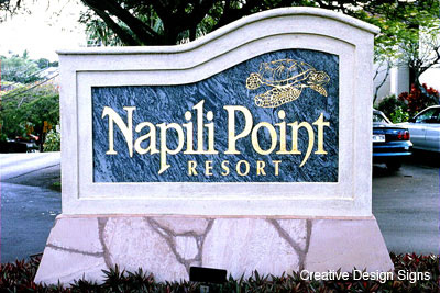 Napili Point - Granite face with gold leaf graphics and logo. Stucco frame and sandstone base.