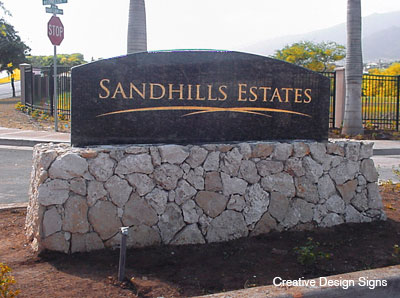 Sandhills Estates - Double faced granite. Etched gold leaf, mounted on coral base.