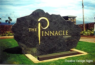 The Pinnacle - Sand carved granite etched with gold leaf. Custom graphics on cast base with recessed light pit.
