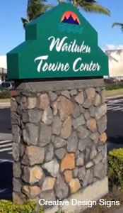 Wailuku Towne Center - Light cabinet internally lit with LEDs. Mounted on natural stone wall.